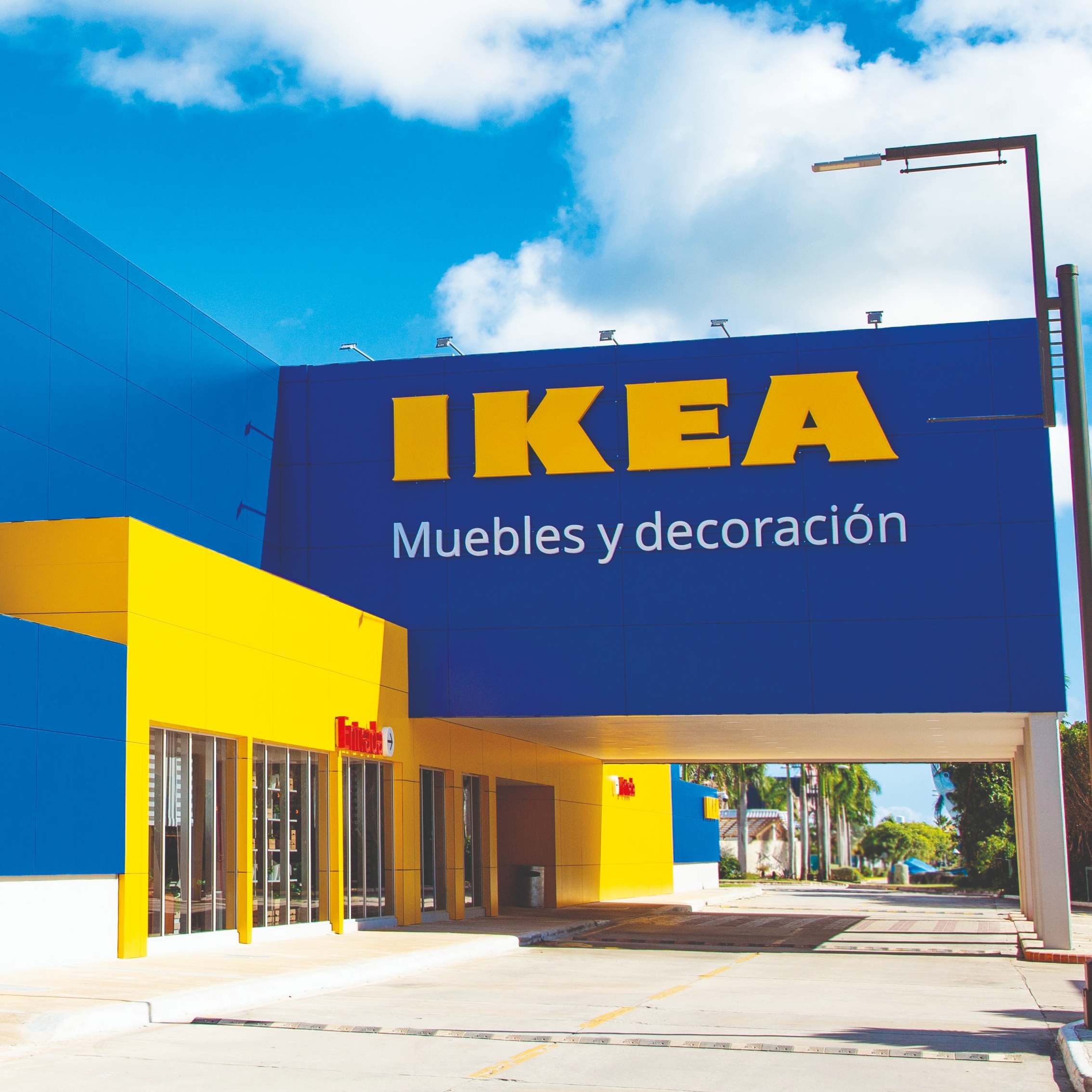 IKEA store facade with logo and home furnishings sign.